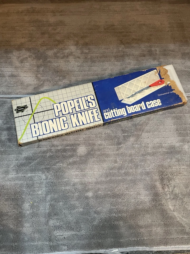Cuchillo biónico vintage Popeil's hoja de 8" con estuche de tabla de cortar años 70 color naranja Foto 2 de 4
