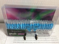WEDDING OR PROM GARTERS New in plastic casing TURQUOISE Garter w/sequin bow