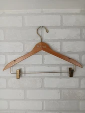 THE DRAKE HOTEL CHICAGO WOODEN CLOTHING HANGER WITH THE TROUSER CLIPS GOLD PRINT