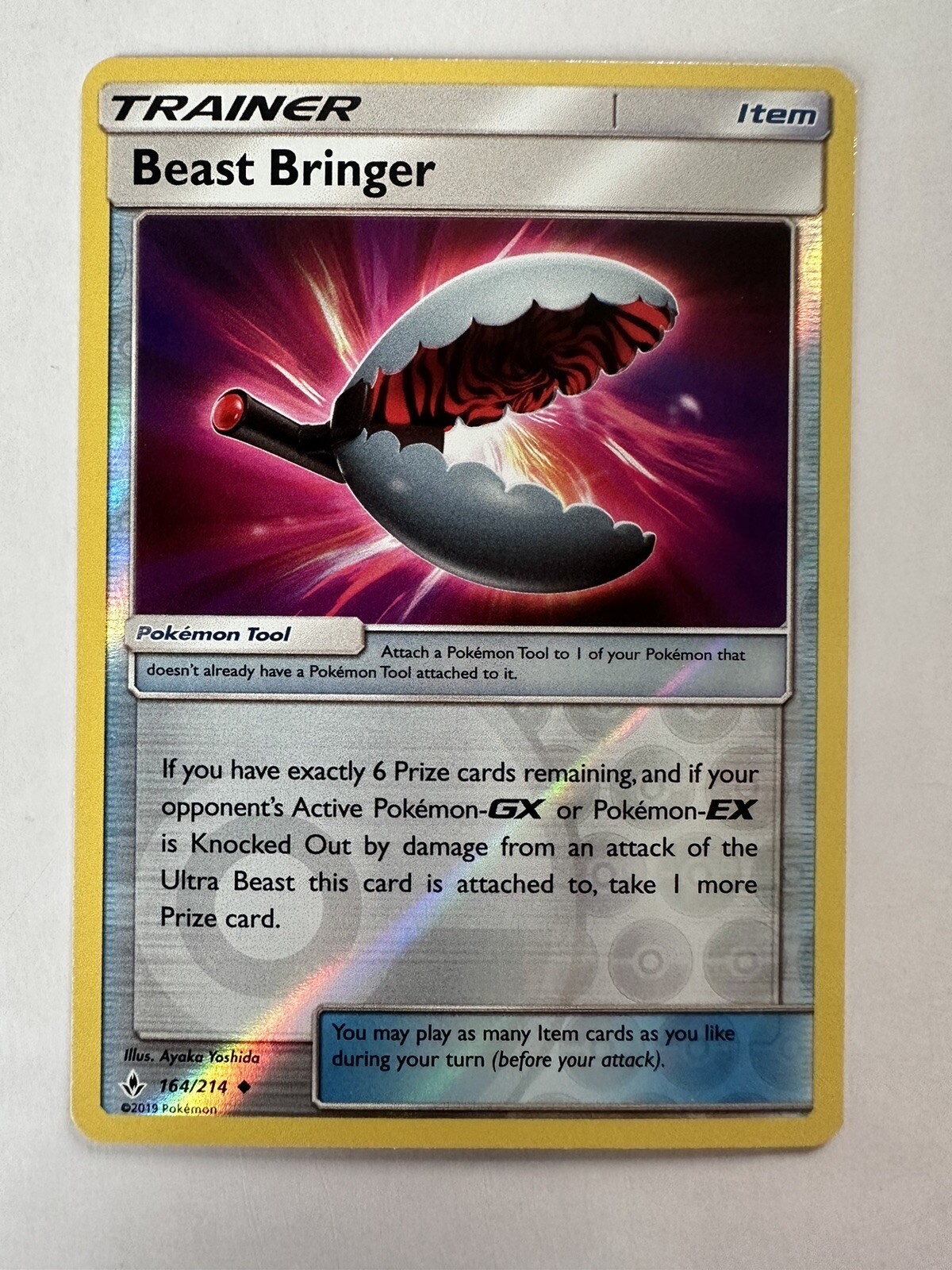 Beast Bringer 164/214 Reverse Holo SM Unbroken Bonds Pokemon TCG Card NM