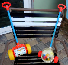 2 Fisher Price  1970/80  Push Toys Work Perfectly Corn Popper & Musical Roller