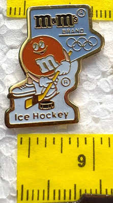 Olympics M&M'S BRAND Ice Hockey Metal VTG Lapel Tack Pin Badge Gold-Tone 