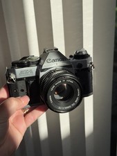 Canon AE-1 Program 35mm Manual SLR Film Camera with 50mm 1:1.8 Lens -with extras