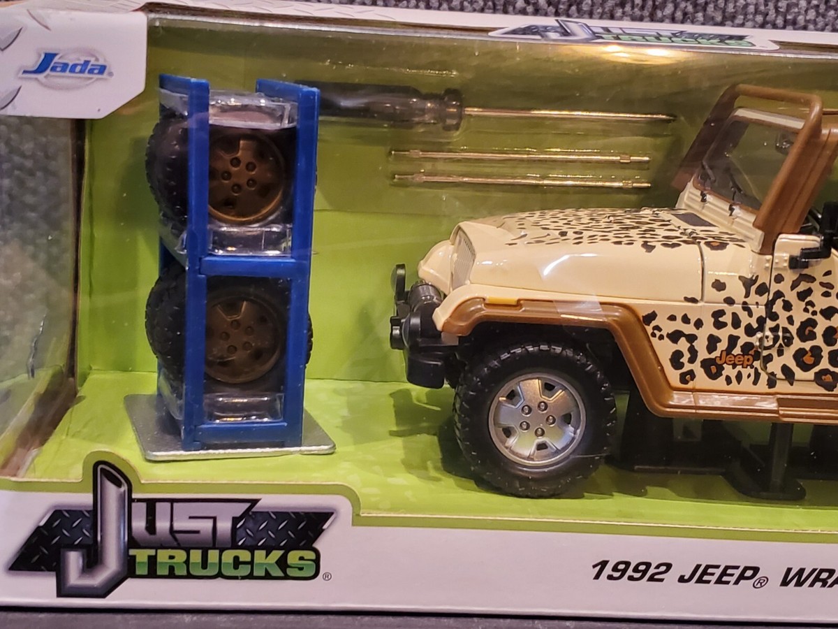 JADA Just Trucks 1992 Jeep Wrangler w/Tire Rack Kit 1:24 Diecast Leopard Print JADA Just Trucks 1992 Jeep Wrangler w/Tire Rack Kit 1:24 Diecast Leopard Print