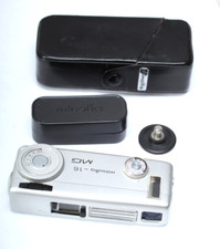MINOLTA 16 MG SUB MINIATURE CAMERA WITH CASE AND FILM BOX WORKS BUT NEEDS WORK
