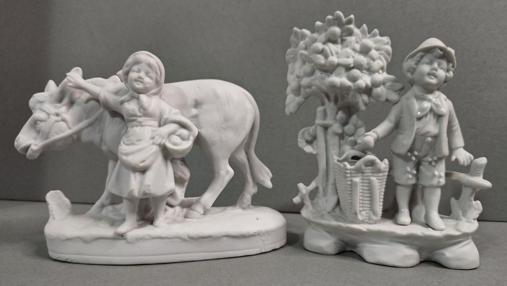 Pair of Bisque Children Harvesting Fruit,Unsigned but numbered 5