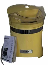 Yellow Oster Ice Cream Maker With Manual