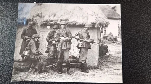 WW2 German Photo: SS Grenadiers in Captured Russian Village, Eastern Front 1941