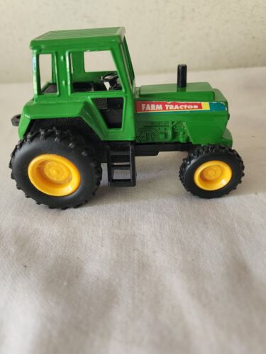 Diecast green farm tractor toy - Picture 1 of 3