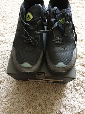 white adidas human race