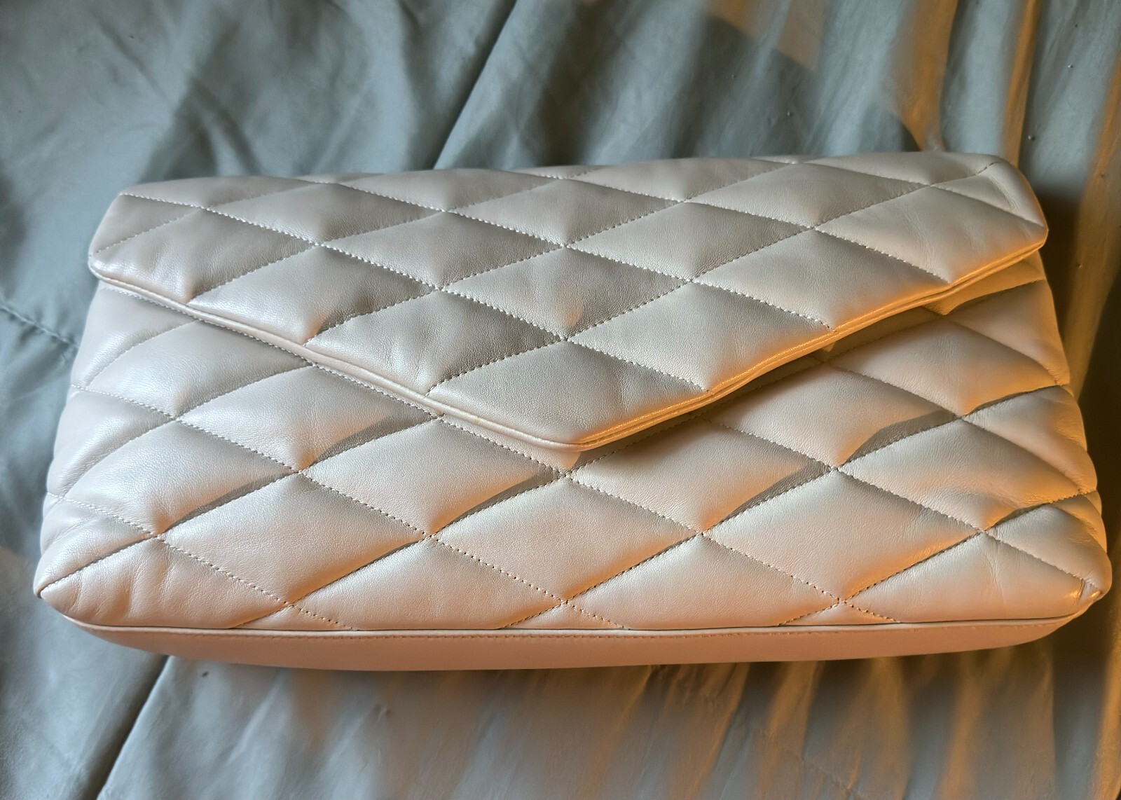 Pochette Saint Laurent Puffer in pelle crema morbida sade