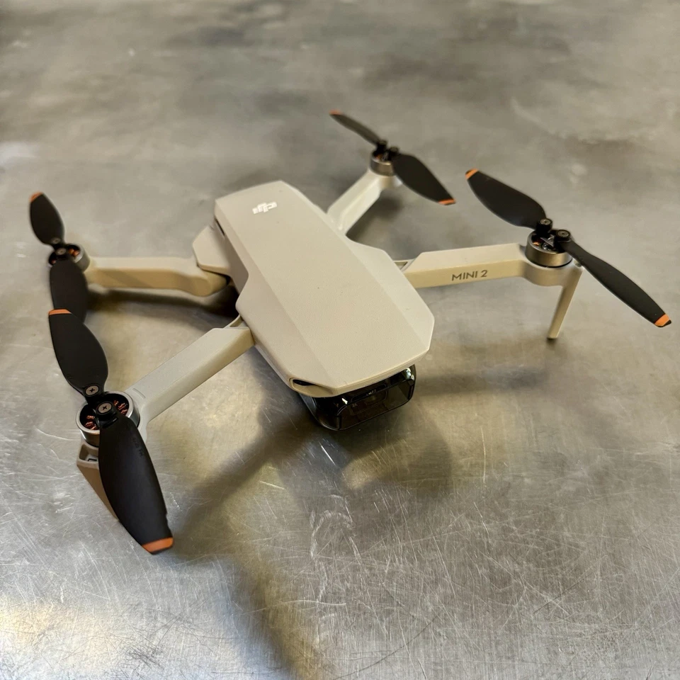 Look… DJI Mini 2 Drone Fly More Combo Bundle + 360 Propeller Guard - Used Once - Image 2 of 4