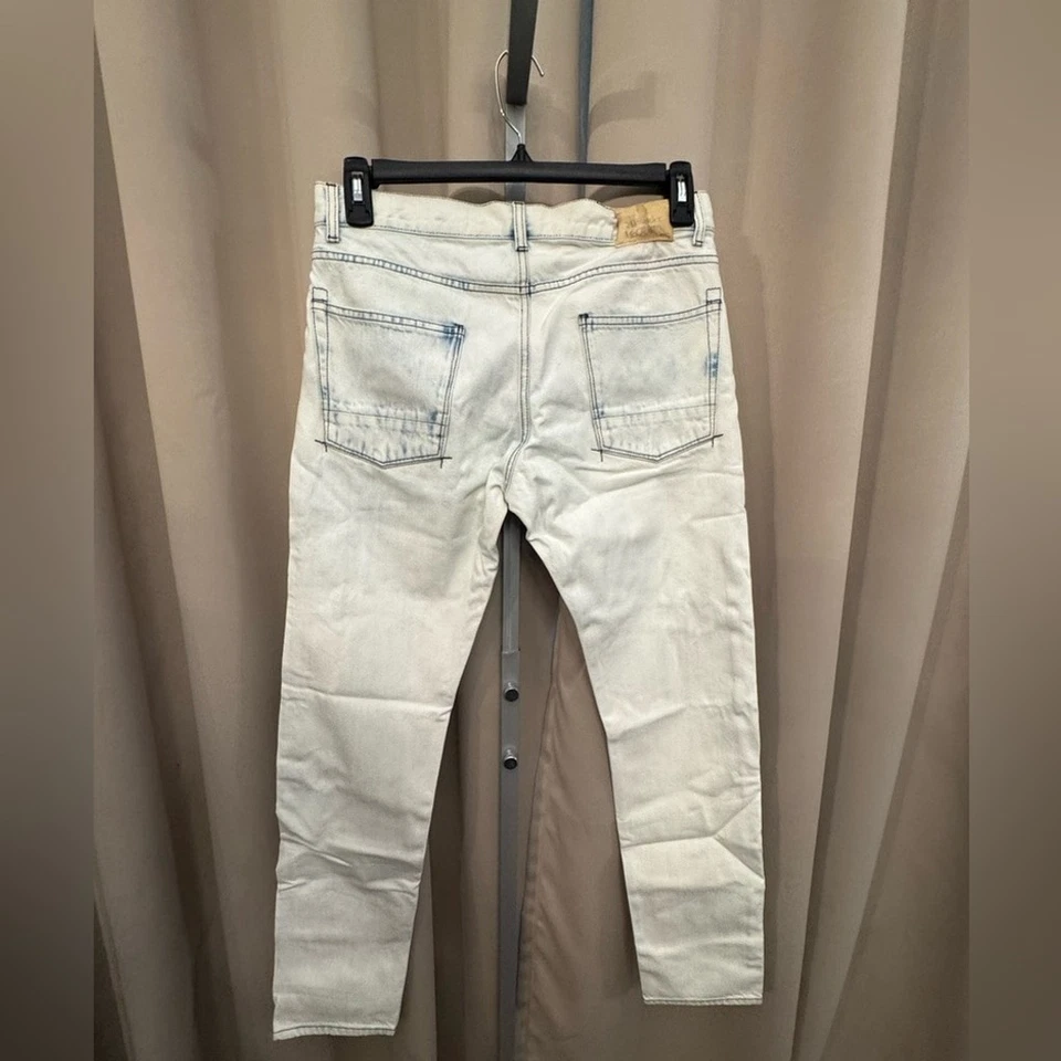 Alexander McQueen acid washed men’s jeans. The back patch has damage as pictured - Image 2 of 4