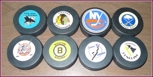 Lot Of 8 Vintage NHL Hockey Pucks Trench Mfg. TOP
