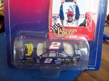 RUSTY WALLACE ADVENTURES OF RUSTY FORD TAURUS 1/64 SCALE NASCAR WINNERS CIRCLE
