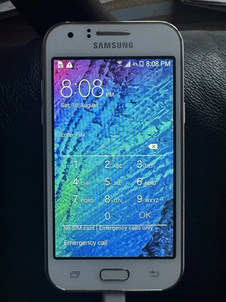 Samsung Galaxy J SM-J100H - 4GB - White (Unlocked) Smartphone, photo 1 of 3
