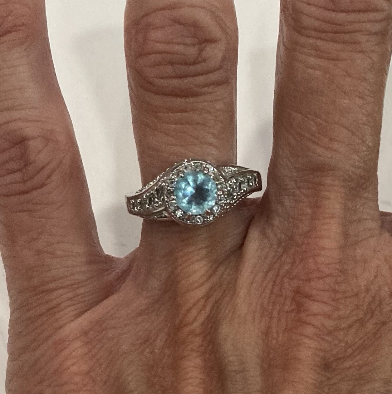 925 Sterling Silver Ring with Round Aquamarine Colored Stone with CZ’s - Size 8