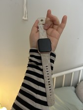 Apple Watch SE 44mm Rose Gold Aluminum GPS with Beige Silicone Band