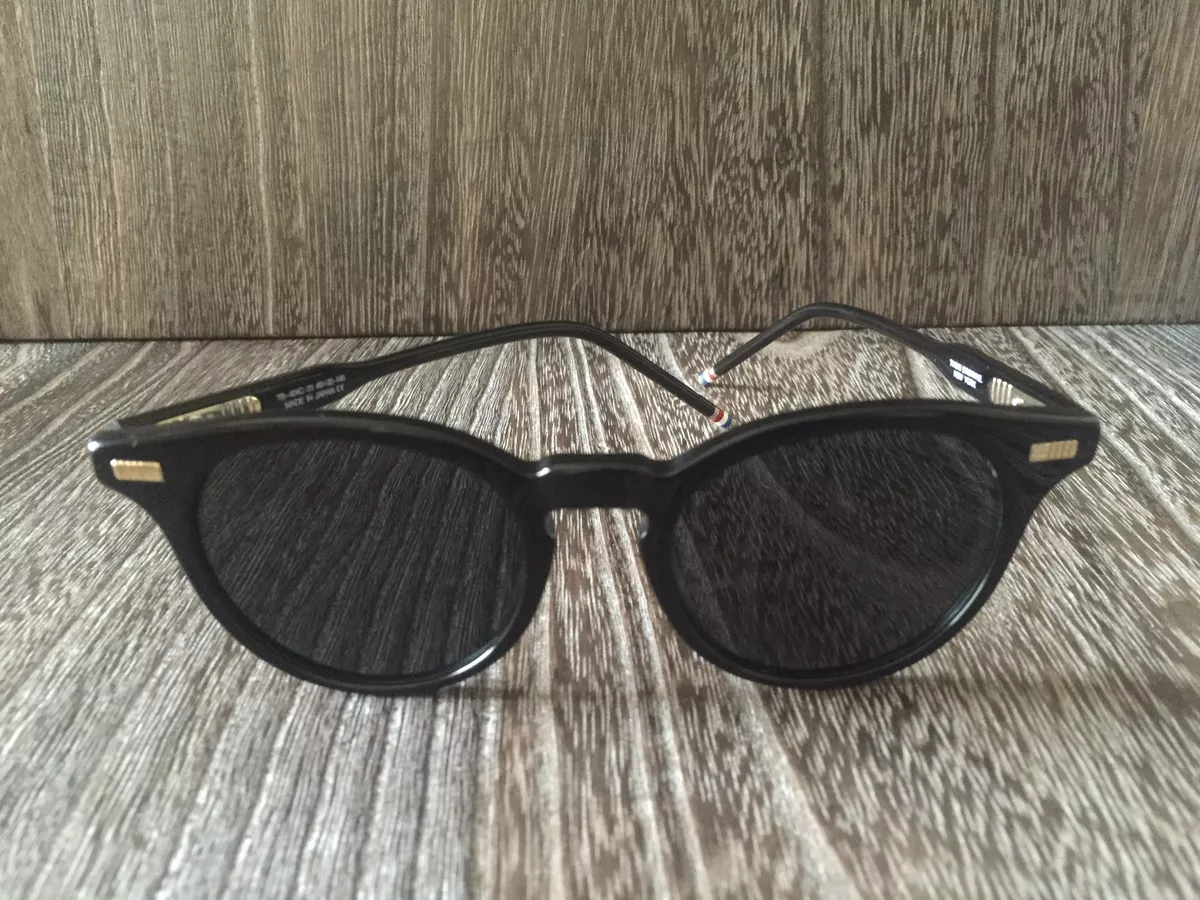 Dark designer clearance sunglasses