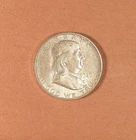1949-S Franklin Half Dollar grades BU,  Lustrous with Light Speckled Toning.