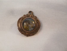 Antique bubble glass front green glass back charm cabin scene