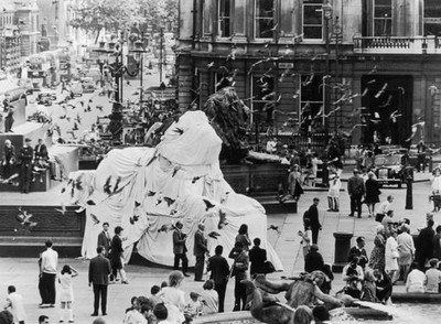 One of Landseer's famous lions Trafalgar Square is covered dust sh- Old Photo