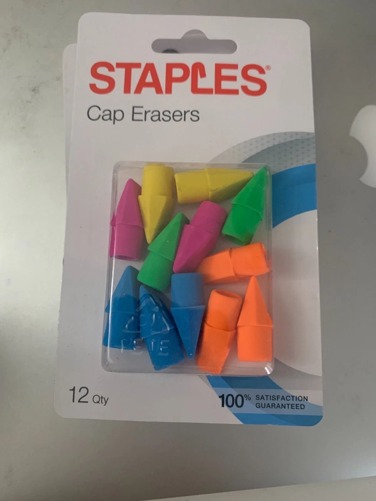 Staples cap erasers neon