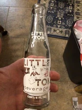ACL SODA BOTTLE LITTLE TOM BEVERAGES OHIO. PICTURE LABEL MAN PICTURED 