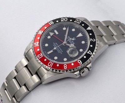ROLEX OYSTER PERPETUAL GMT MASTER II COKE EDELSTAHL REF.: 16710 PAPIERE/BOX