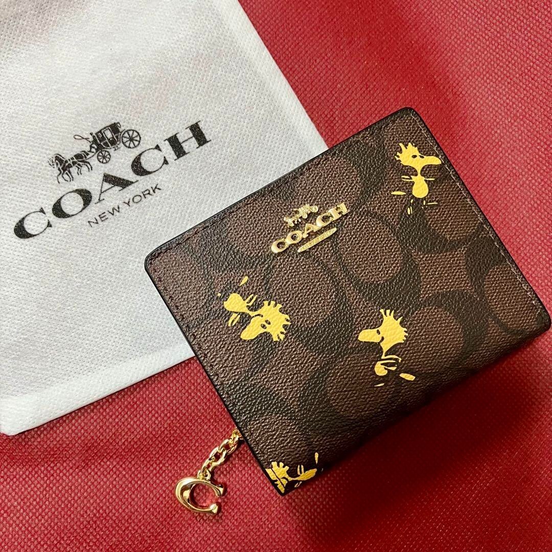 COACH x Peanuts Small Zip Around Wallet Signature Woodstock Print