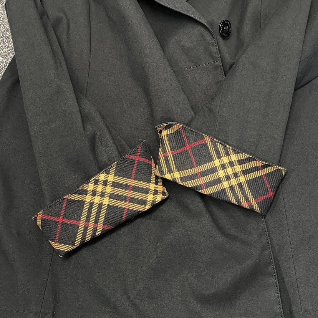 Chaqueta de trinchera BURBERRY BLUE LABEL negra puños a cuadros Nova elásticos JP 38 US S