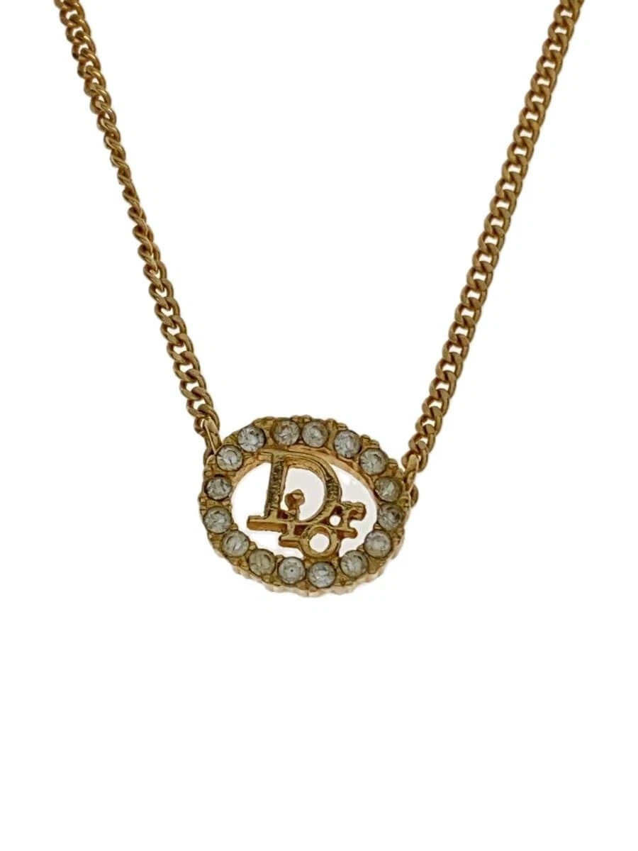 Collier Christian Dior    Femme avec haut doré