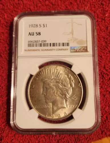 1928 s silver peace dollar NGC AU  58