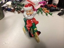 Vintage Santa's Green Wind-up Tricycle Collectible Winds Up  Moves With A Push