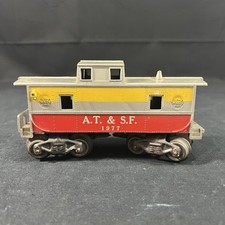Marx 1977 A.T.& S.F. Caboose - Gray Body with Yellow & Red bands - 8 wheel