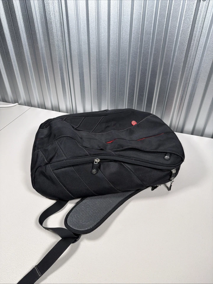 Bolso acolchado para computadora portátil Booq Mamba Shift Turtle Shell acolchado negro/rojo Foto 3 de 4