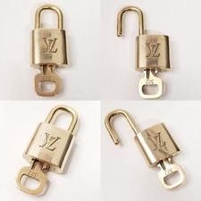 Authentic Louis Vuitton Gold Padlock with Key Shiny