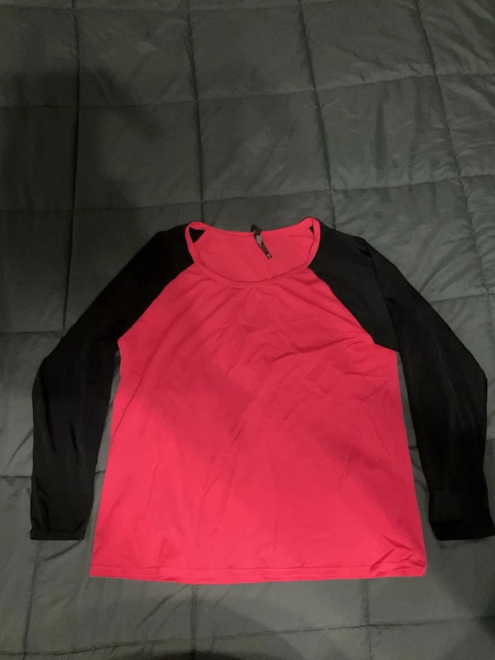 (44) TORRID RAGLÁN ERUPCIONES PROTECTOR Coral Caliente y Negro Foto 3 de 4