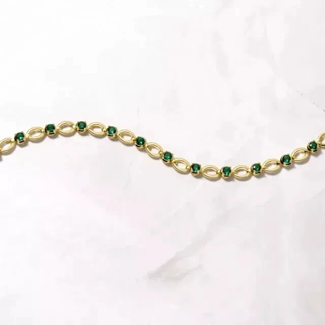 Brazalete tenis mujer corte redondo simulado verde esmeralda chapado en oro amarillo 14K Foto 2 de 4