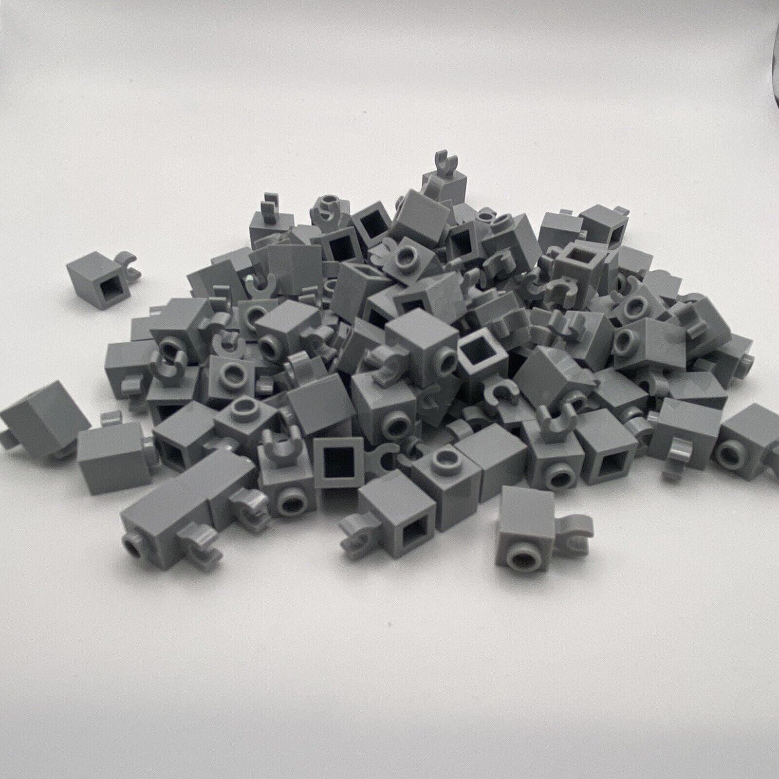 Lego 65460 - Lot of 100 Pieces in Med. Stone Grey - Brick 1x1 w/Holder - 6345426