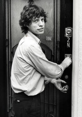 Mick Jagger arrives at his apartment following a Jimmy Cliff perfo- 1981 Photo