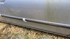 Baguette de porte Mazda 323