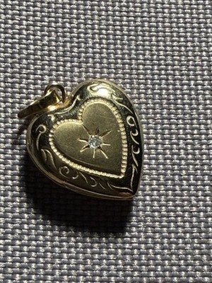 Echtes 14kt Gelbgold 12mm mit 0,01 karat. Diamond Star Herzmedaillon