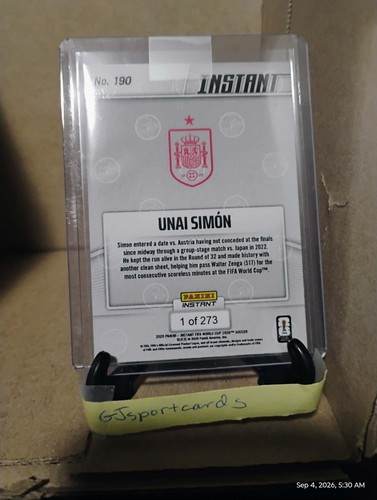 2026 Panini Instant FIFA World Cup #190 Unai Simon Spain card with stats, red accents, and “Ships ASAP” text.