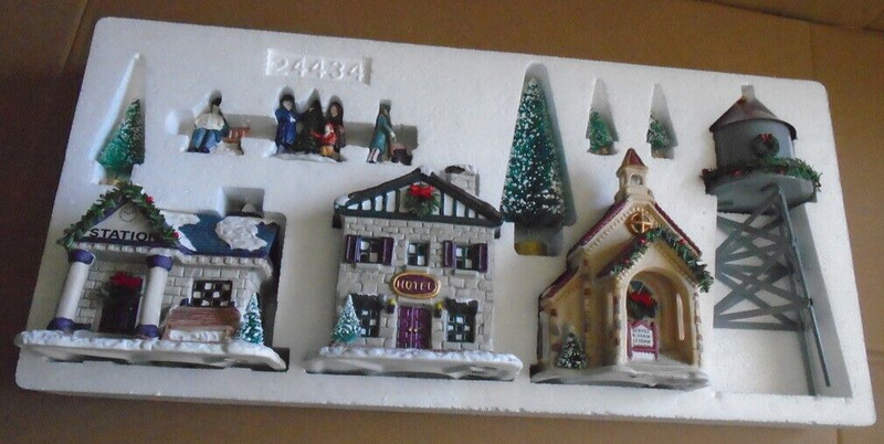 City Sidewalks 12 Piece Hand Painted Porcelain Illuminated Christmas Village Set
