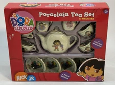 Dora The Explorer Porcelain 4 Place Setting 13 Piece Tea Set Keepsake -Sealed
