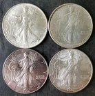 1986, 1993, 1999, and 2001 $1 American Silver Eagle Dollars