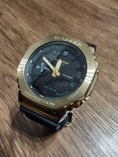 CASIO G SHOCK GM 2100G Gold x Black