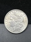 1899-P Morgan Silver Dollar 90% UNC US Coin D93
