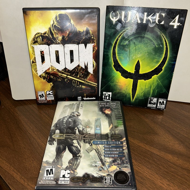3 (Three) PC Video Games. Doom, Crysis 2 and Quake 4.